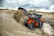 Wheel Loader dropping dirt,New Hitachi working in field,Hitachi Loader inside working,New Loader moving dirt in yard